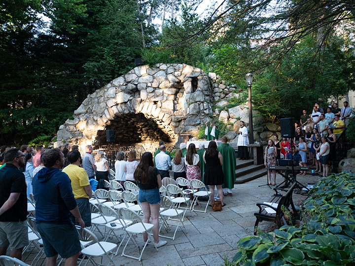 ACE teachers and leaders praying at the Grotto. 