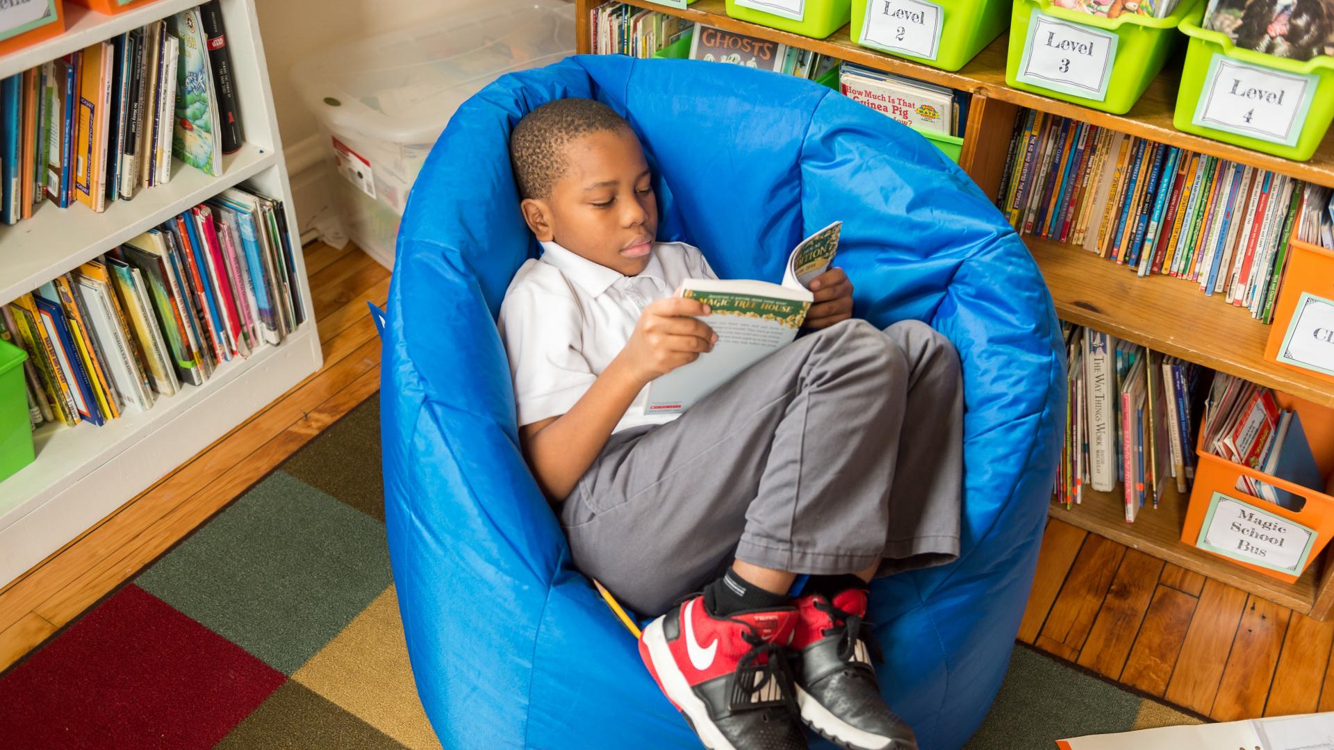 Student reading in nook