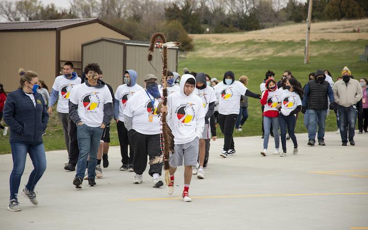 Students Walking the Red Path