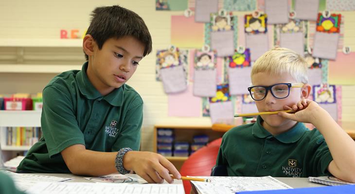 Students talking to each other.