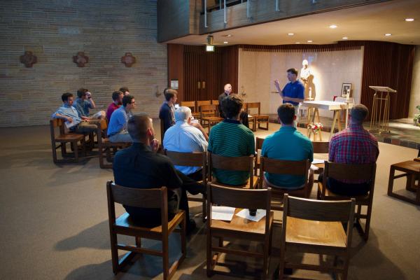 Man speaking at Discernment Retreat