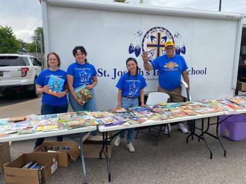 St. Joseph Indian School volunteers at the bookmobile
