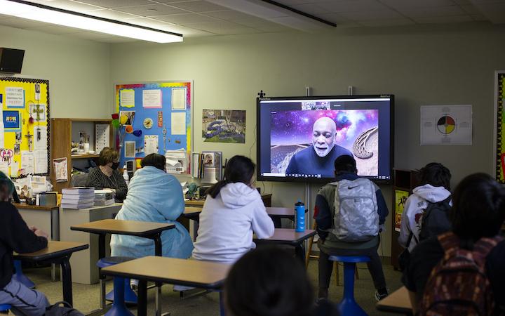 Students talking with Diggs on video chat