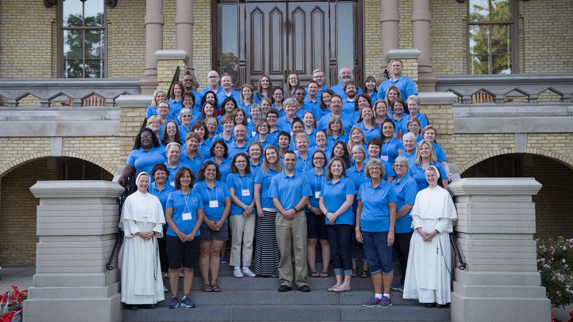 LEI Cohort on steps of Main Building