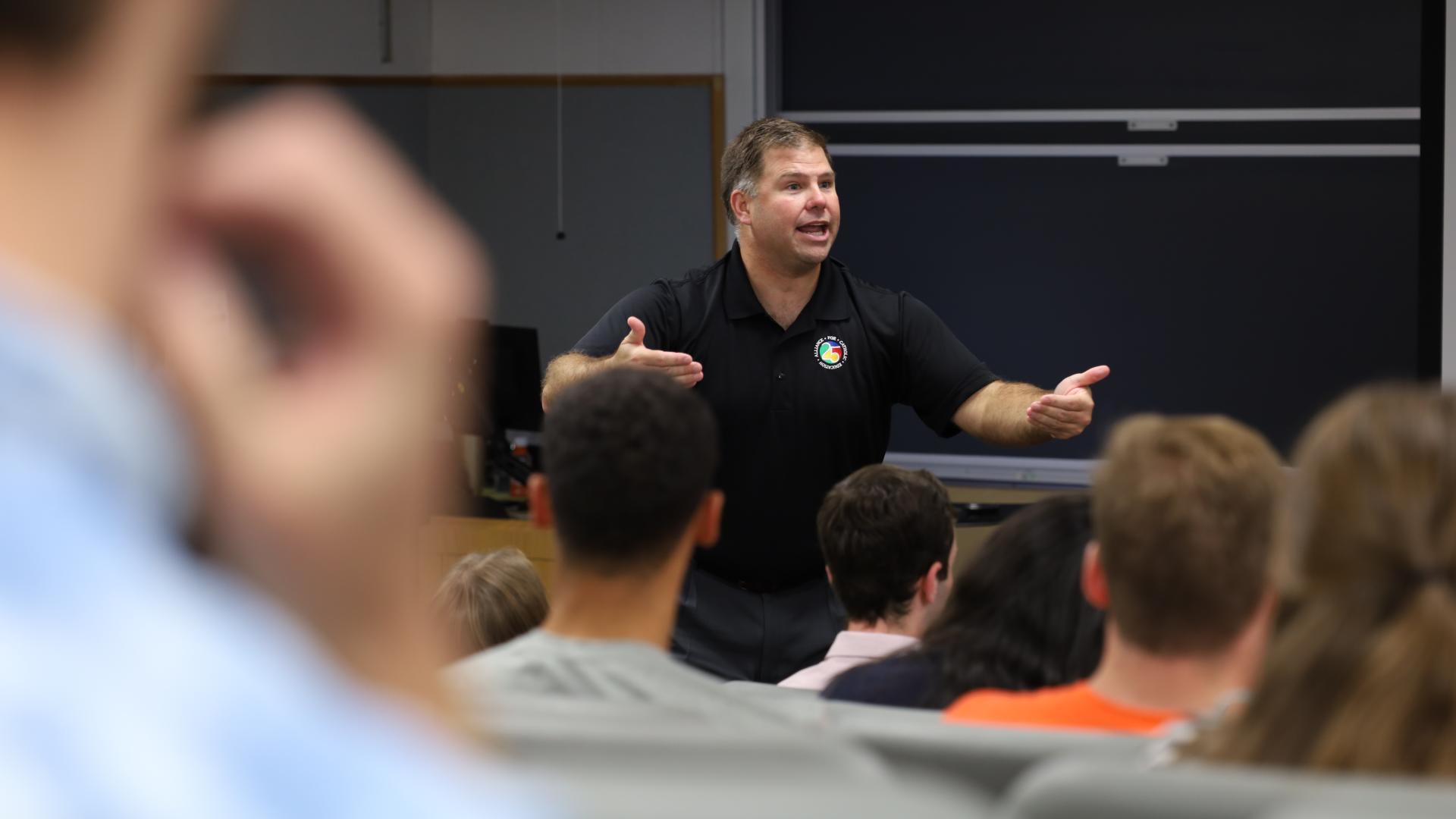 Image of Ted Caron speaking to a class